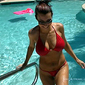 hot milf getting out of the swimming pool in a sexy red bikini gstring bottom on Adult DVD