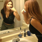 cute girl next door with big tits in tight t shirt brushing her teeth with toothbrush in the bathroom mirror and smiling on Adult XXX Video with free preview trailer