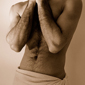 sexy man with hairy chest out of shower and towel wrapped around his waist